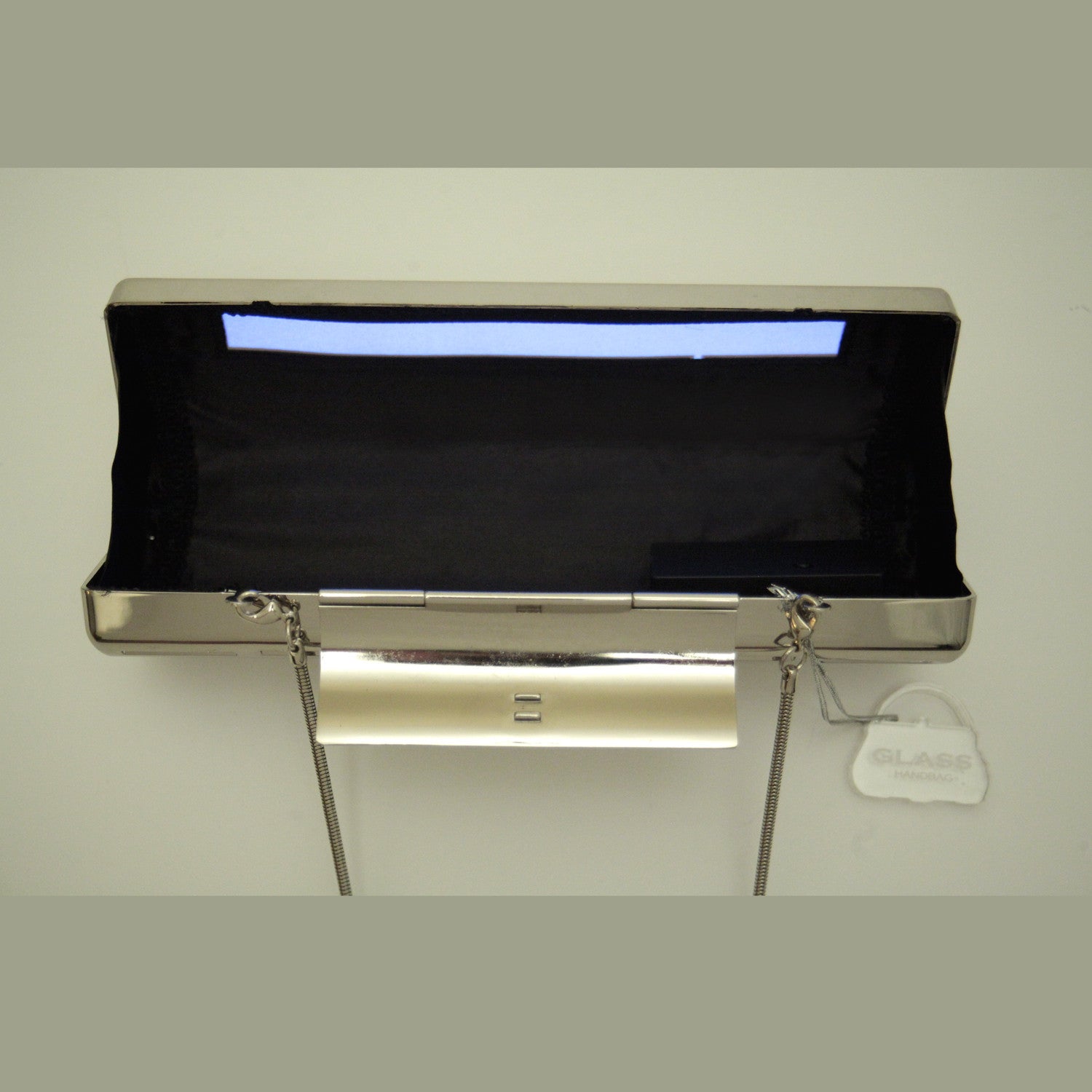 Glass Handbag Rave metal clutch in silver with lighting system